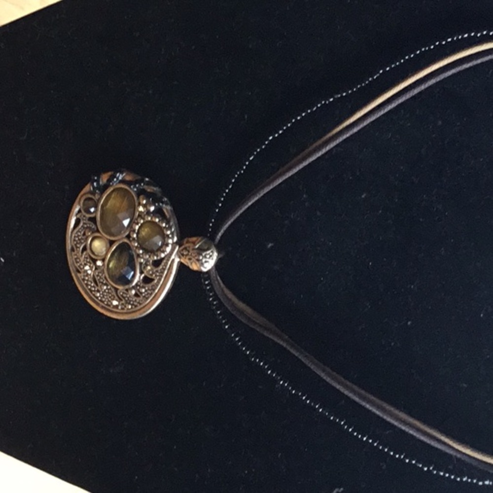 Pendant with gold and green stones